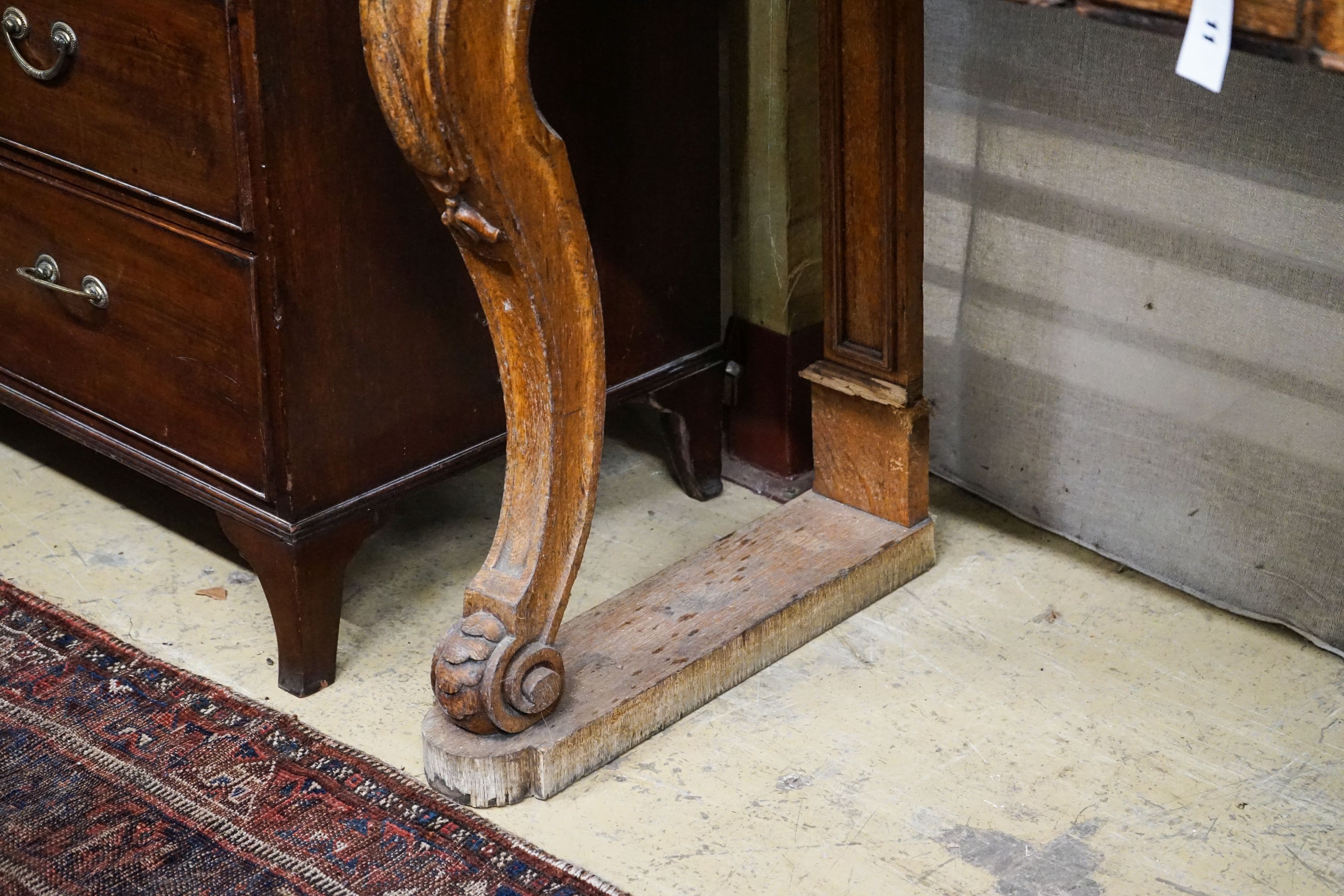 A mid Victorian oak marble topped two drawer console table, width 138cm, depth 54cm, height 120cm